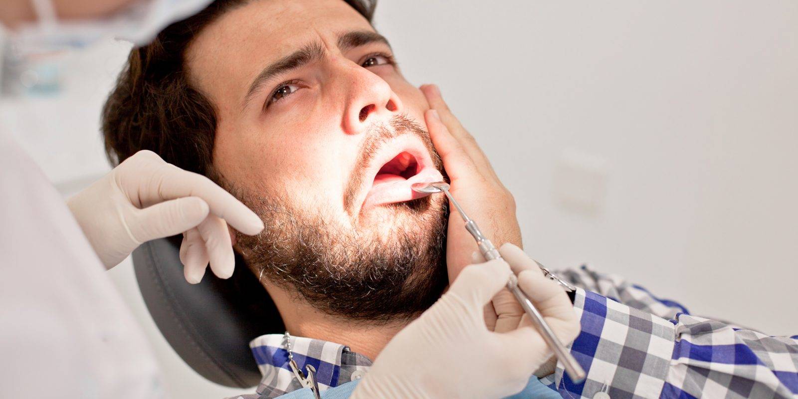 Острая зубная боль: причины, последствия, лечение